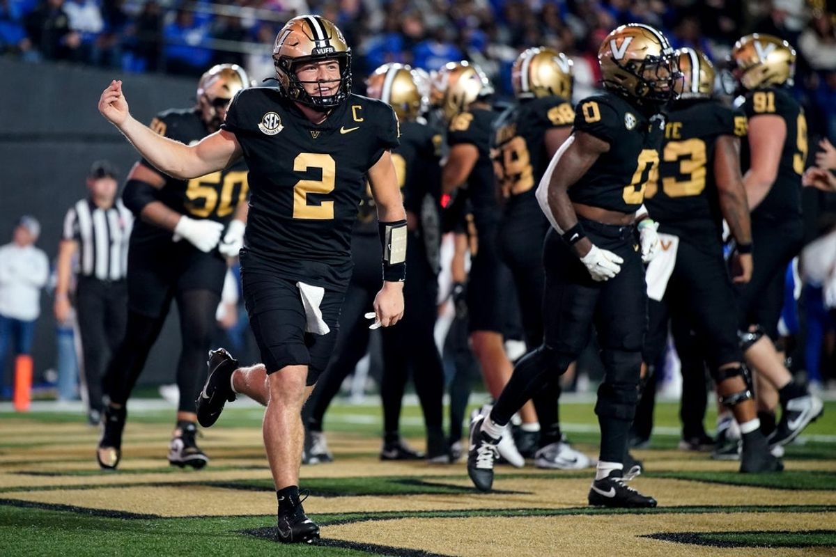 Vanderbilt quarterback Diego Pavia (2) celebrates after wide receiver Richie Hoskins scoring a touchdown against Kentucky during the third quarter at FirstBank Stadium in Nashville, Tenn., Saturday, Nov. 22, 2025.