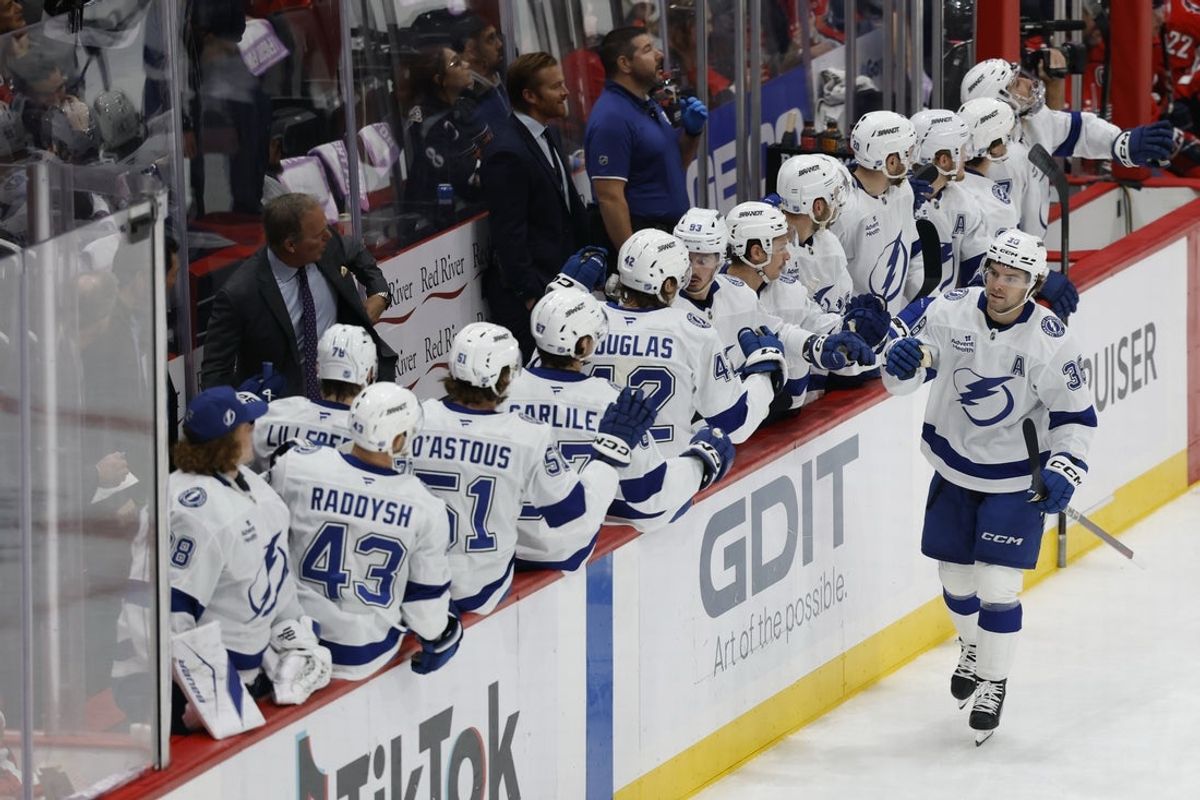 Nov 22, 2025; Washington, District of Columbia, USA; Tampa Bay Lightning left wing Brandon Hagel (38) celebrates with teammates after scoring a goal against the Washington Capitals during the first period at Capital One Arena. Mandatory Credit: Geoff Burke-Imagn Images