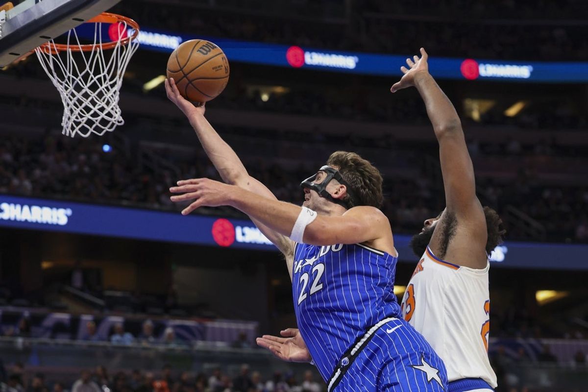 Nov 7, 2025; Orlando, Florida, USA; Orlando Magic forward Franz Wagner (22) drives to the basket against the New York Knicks in the third quarter at Kia Center. Mandatory Credit: Nathan Ray Seebeck-Imagn Images