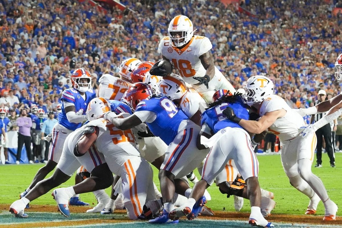 Tennessee running back DeSean Bishop (18) scores a touchdown during the NCAA college football game against Florida on November 22, 2025, in Gainesville, Florida.
