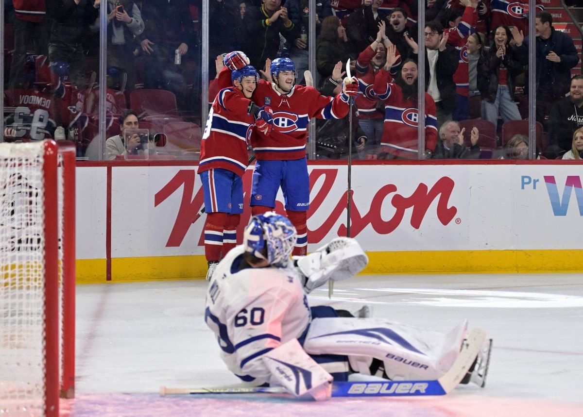 Nov 22, 2025; Montreal, Quebec, CAN; Montreal Canadiens defenseman Noah Dobson (53) celebrates with teammate forward Ivan Demidov (93) after scoring a goal against Toronto Maple Leafs goalie Joseph Woll (60) during the second period at the Bell Centre. Mandatory Credit: Eric Bolte-Imagn Images