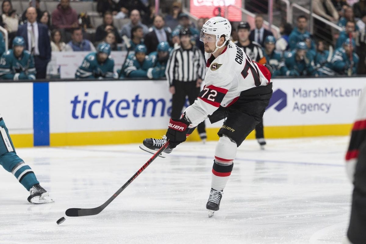 Nov 22, 2025; San Jose, California, USA;  Ottawa Senators defenseman Thomas Chabot (72) shoots the puck during the third period against the San Jose Sharks at SAP Center at San Jose. Mandatory Credit: Stan Szeto-Imagn Images
