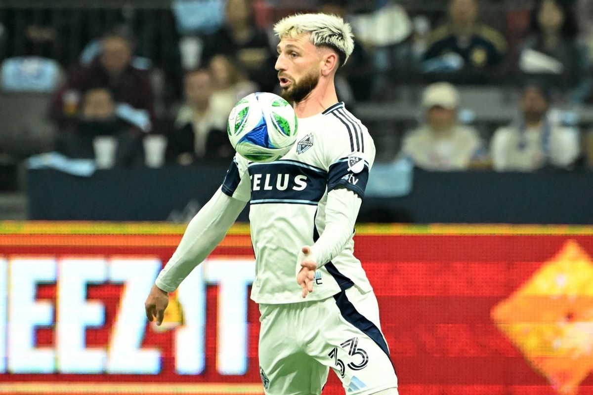 Nov 22, 2025; Vancouver, British Columbia, CAN; Vancouver Whitecaps FC defender Tristan Blackmon (33) controls the ball against Los Angeles FC during the first half at BC Place. Mandatory Credit: Simon Fearn-Imagn Images