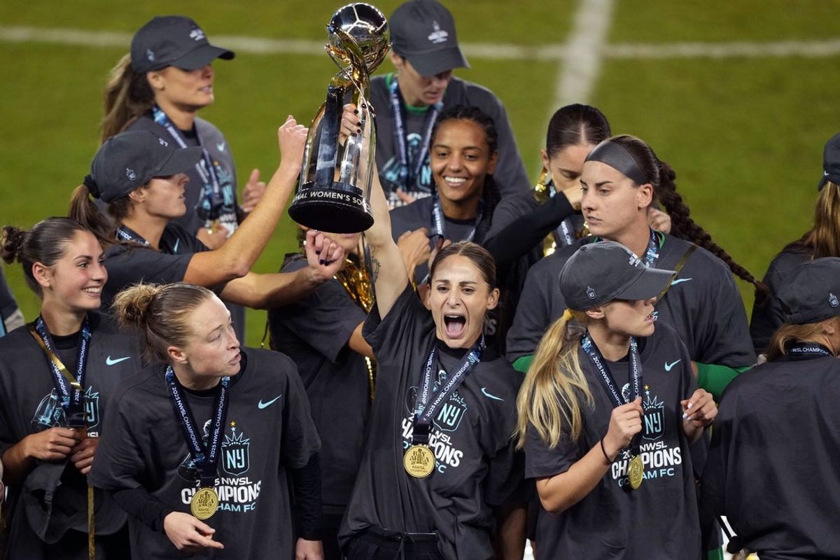 Nov 22, 2025; San Jose, California, USA; Gotham FC forward Esther Gonzalez (9) celebrates with the trophy after defeating the Washington Spirit in the 2025 NWSL Championship at PayPal Park. Mandatory Credit: Darren Yamashita-Imagn Images