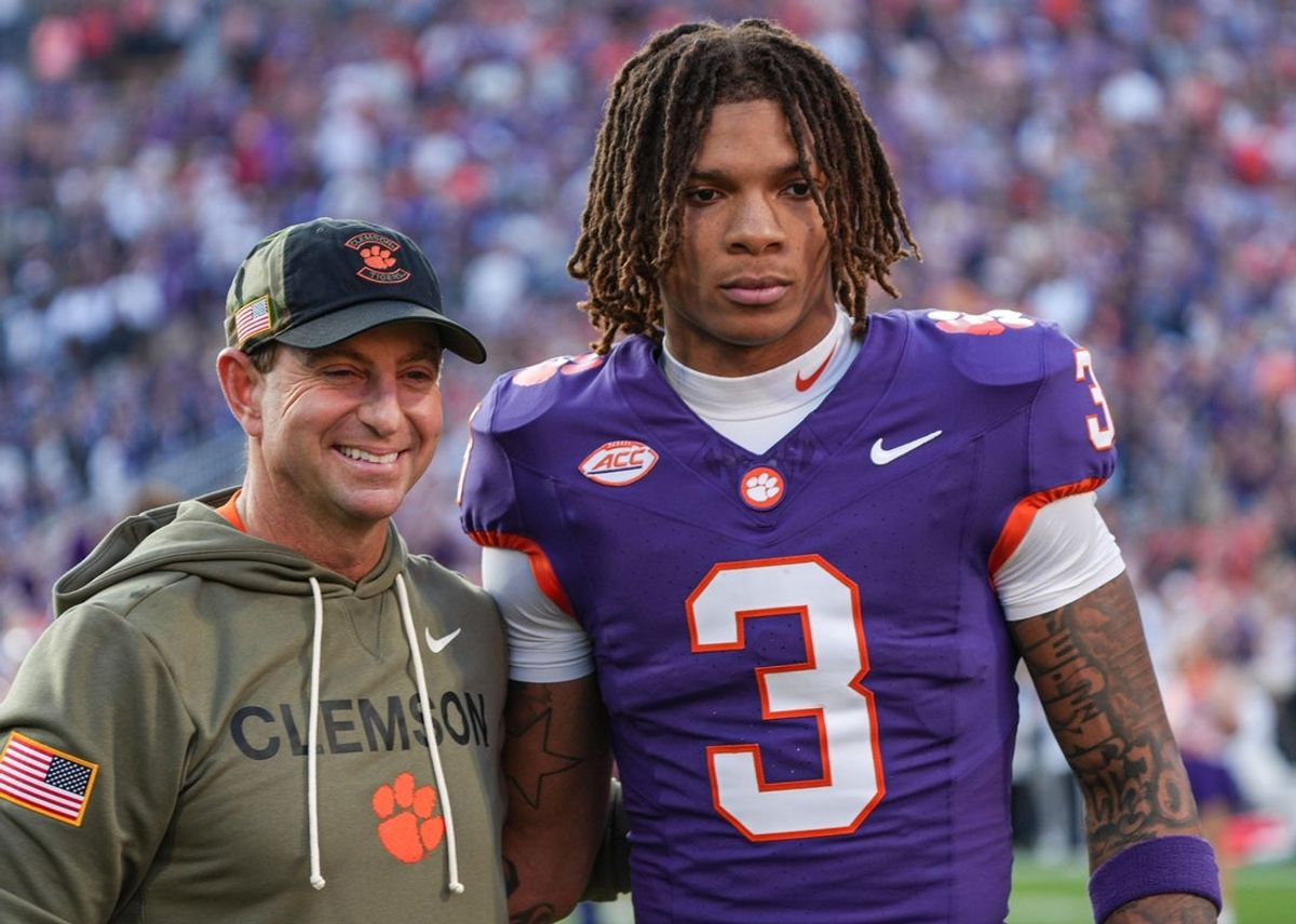 Clemson head coach Dabo Swinney with wide receiver Tristan Smith (3) before kickoff with Furman University at Memorial Stadium in Clemson, SC, Saturday, November 22, 2025.