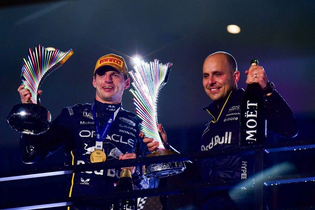 Nov 21, 2025; Las Vegas, NV, USA; Red Bull Racing driver Max Verstappen (1) celebrates his victory with race engineer Gianpiero Lambiase at Las Vegas Strip Circuit. Mandatory Credit: Gary A. Vasquez-Imagn Images
