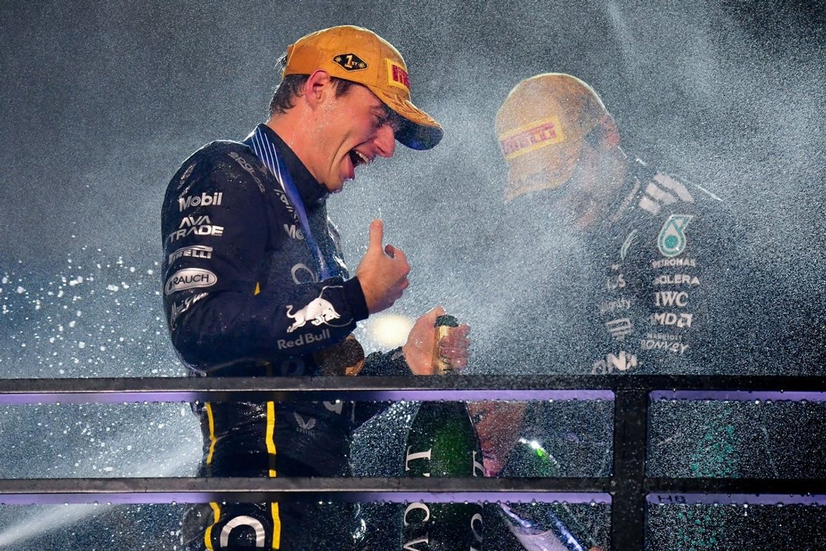 Nov 21, 2025; Las Vegas, NV, USA; Red Bull Racing driver Max Verstappen (1) celebrates his victory of the Las Vegas Grand Prix at Las Vegas Strip Circuit. Mandatory Credit: Gary A. Vasquez-Imagn Images