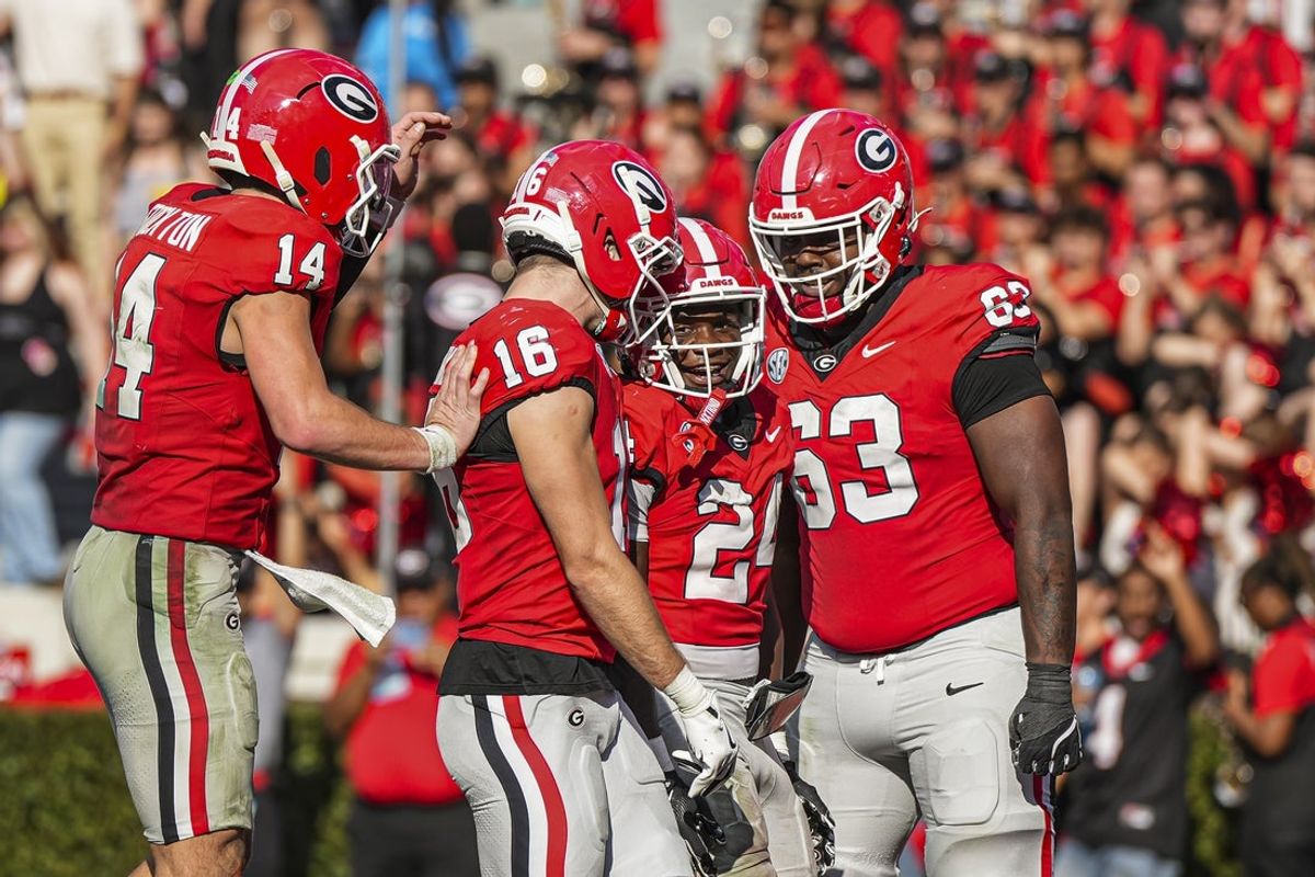 Nov 22, 2025; Athens, Georgia, USA; Georgia Bulldogs running back Bo Walker (24) reacts with teammates after running for a touchdown against the Charlotte 49ers during the second half at Sanford Stadium. Mandatory Credit: Dale Zanine-Imagn Images