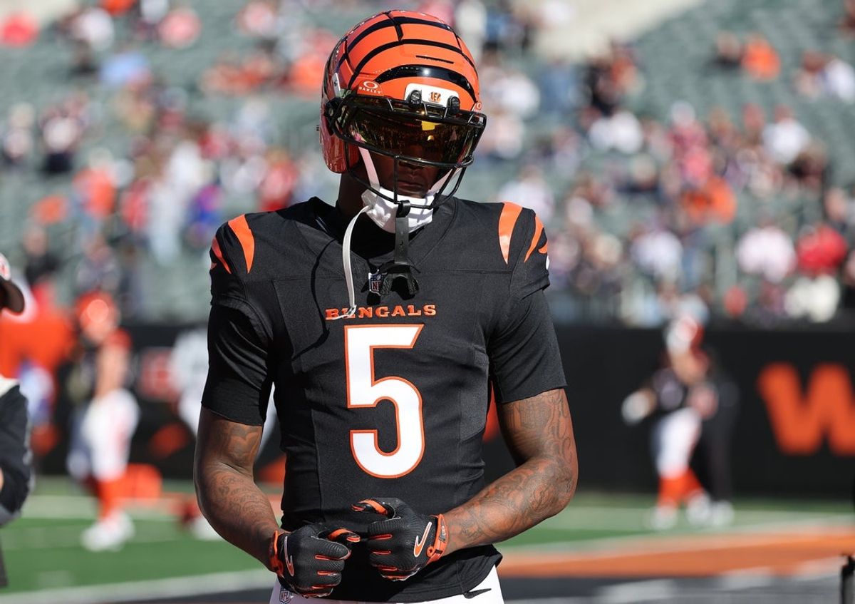 Nov 23, 2025; Cincinnati, Ohio, USA; Cincinnati Bengals wide receiver Tee Higgins (5) warms up before a game against the New England Patriots at Paycor Stadium. Mandatory Credit: Joseph Maiorana-Imagn Images