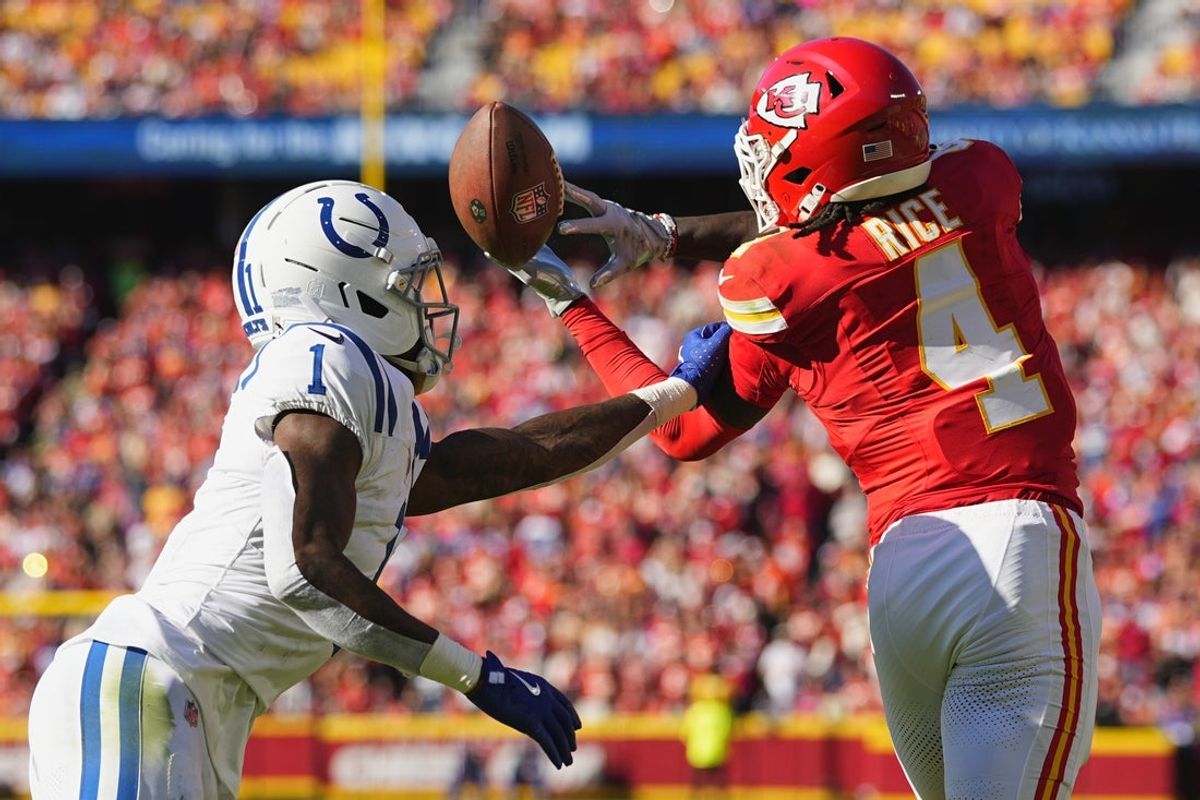 Nov 23, 2025; Kansas City, Missouri, USA;  Kansas City Chiefs wide receiver Rashee Rice (4) cannot make a catch against Indianapolis Colts cornerback Sauce Gardner (1) in the first half at GEHA Field at Arrowhead Stadium. Mandatory Credit: Jay Biggerstaff-Imagn Images