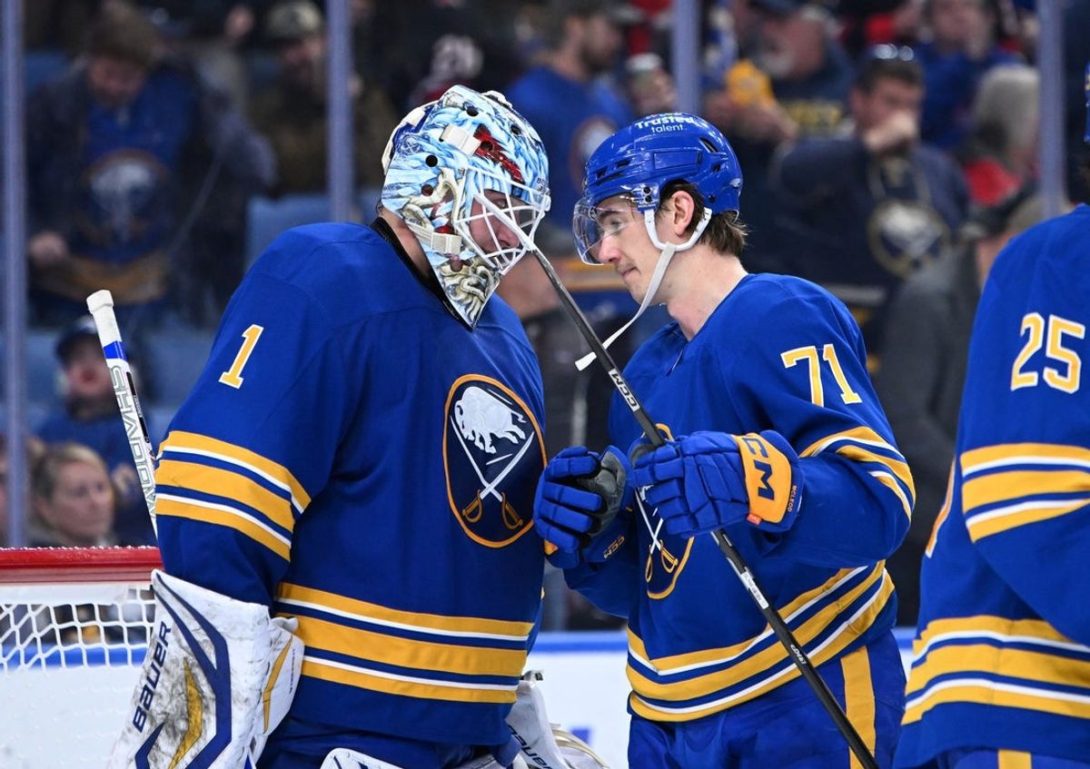 Nov 23, 2025; Buffalo, New York, USA; Buffalo Sabres center Ryan McLeod (71) greets goaltender Ukko-Pekka Luukkonen (1) after a win against the Carolina Hurricanes at KeyBank Center. Mandatory Credit: Mark Konezny-Imagn Images