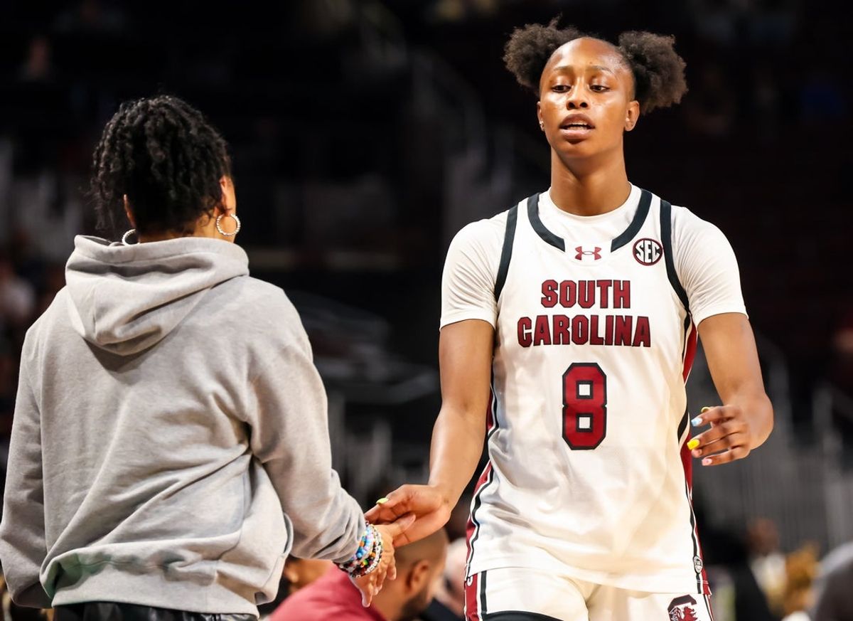 Nov 23, 2025; Columbia, South Carolina, USA; South Carolina Gamecocks head coach Dawn Staley gives forward Joyce Edwards (8) a high five against the Queens Royals in the second half at Colonial Life Arena. Mandatory Credit: Jeff Blake-Imagn Images