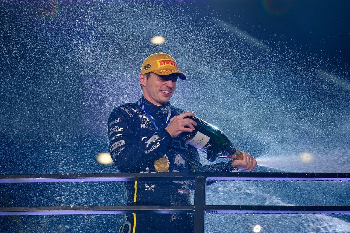 Nov 21, 2025; Las Vegas, NV, USA; Red Bull Racing driver Max Verstappen (1) celebrates his victory of the Las Vegas Grand Prix at Las Vegas Strip Circuit. Mandatory Credit: Gary A. Vasquez-Imagn Images