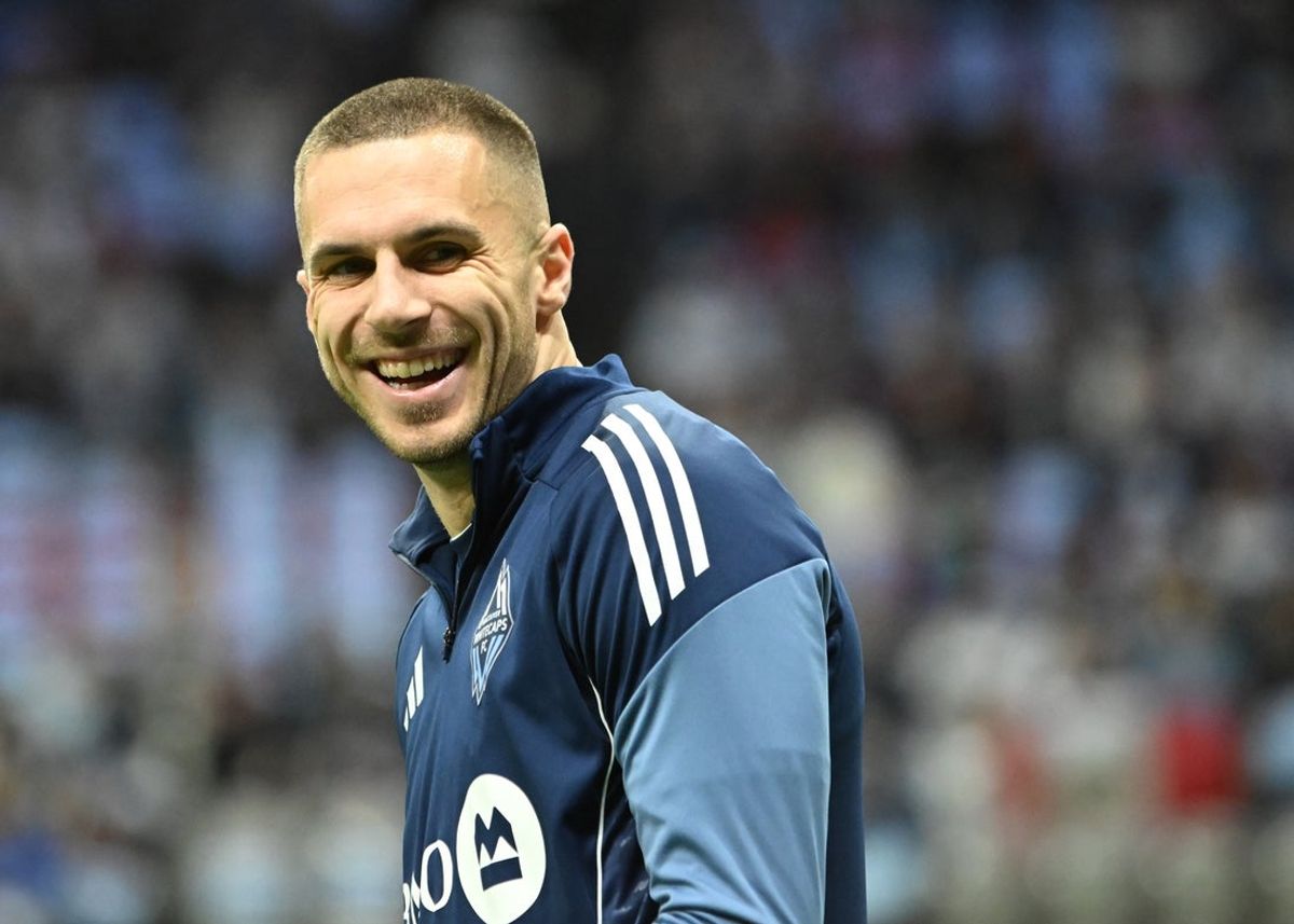 Nov 22, 2025; Vancouver, British Columbia, CAN; Vancouver Whitecaps FC defender Joedrick Pupe (23) takes the field for warm up before taking on Los Angeles FC at BC Place. Mandatory Credit: Simon Fearn-Imagn Images