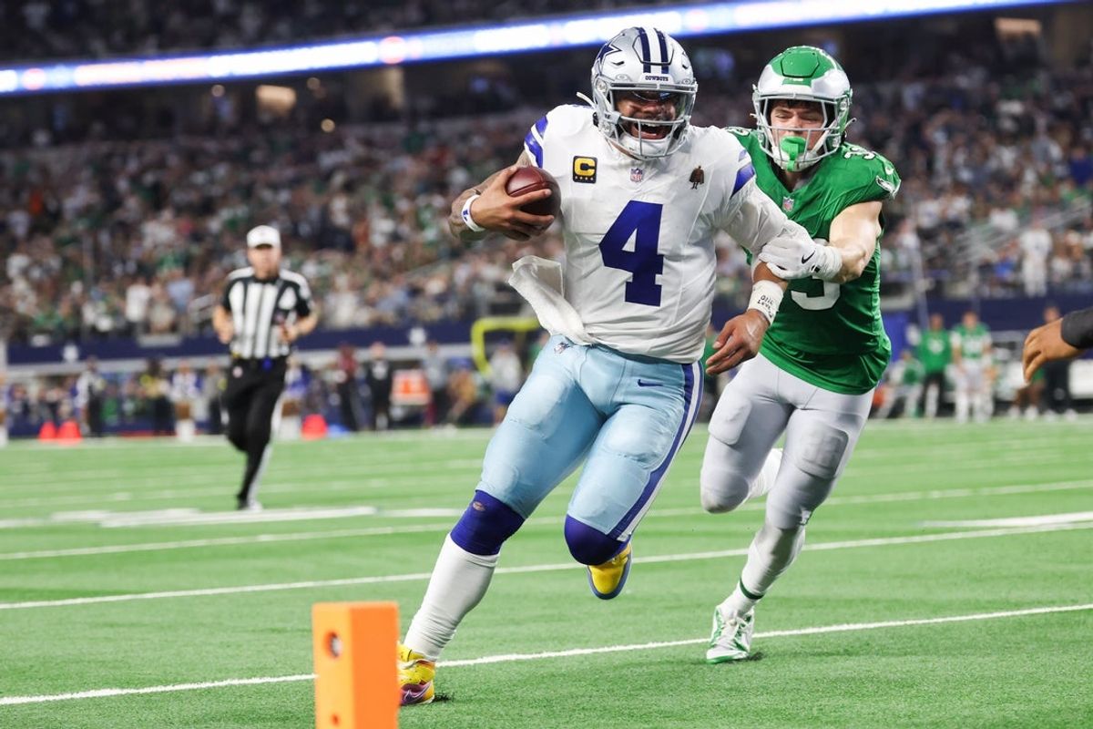 Nov 23, 2025; Arlington, Texas, USA; Dallas Cowboys quarterback Dak Prescott (4) runs with the ball in attempt to score a touchdown in the fourth quarter against the Philadelphia Eagles at AT&T Stadium. Mandatory Credit: Kevin Jairaj-Imagn Images