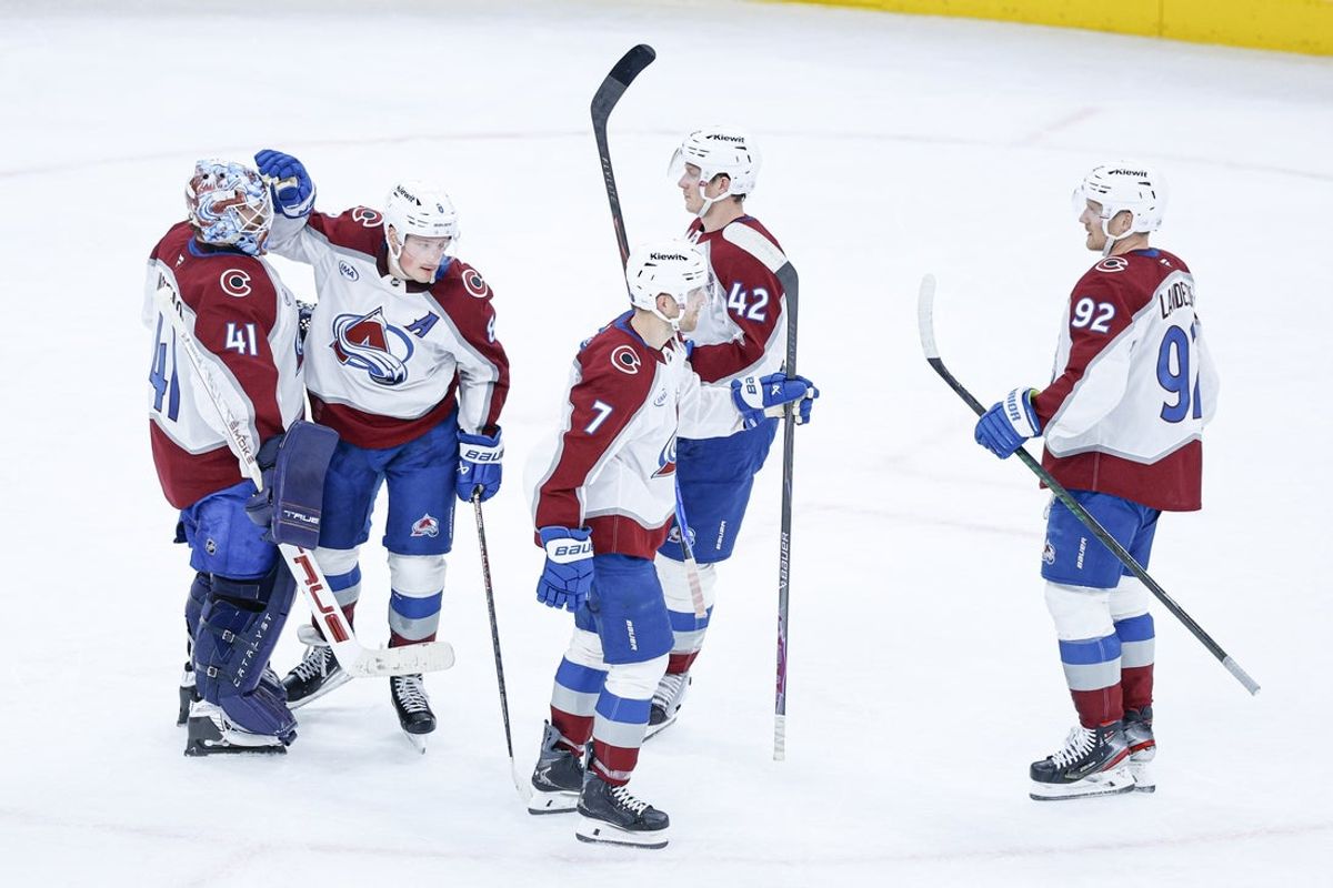 Nov 23, 2025; Chicago, Illinois, USA; Colorado Avalanche players celebrate after defeating the Chicago Blackhawks at United Center. Mandatory Credit: Kamil Krzaczynski-Imagn Images