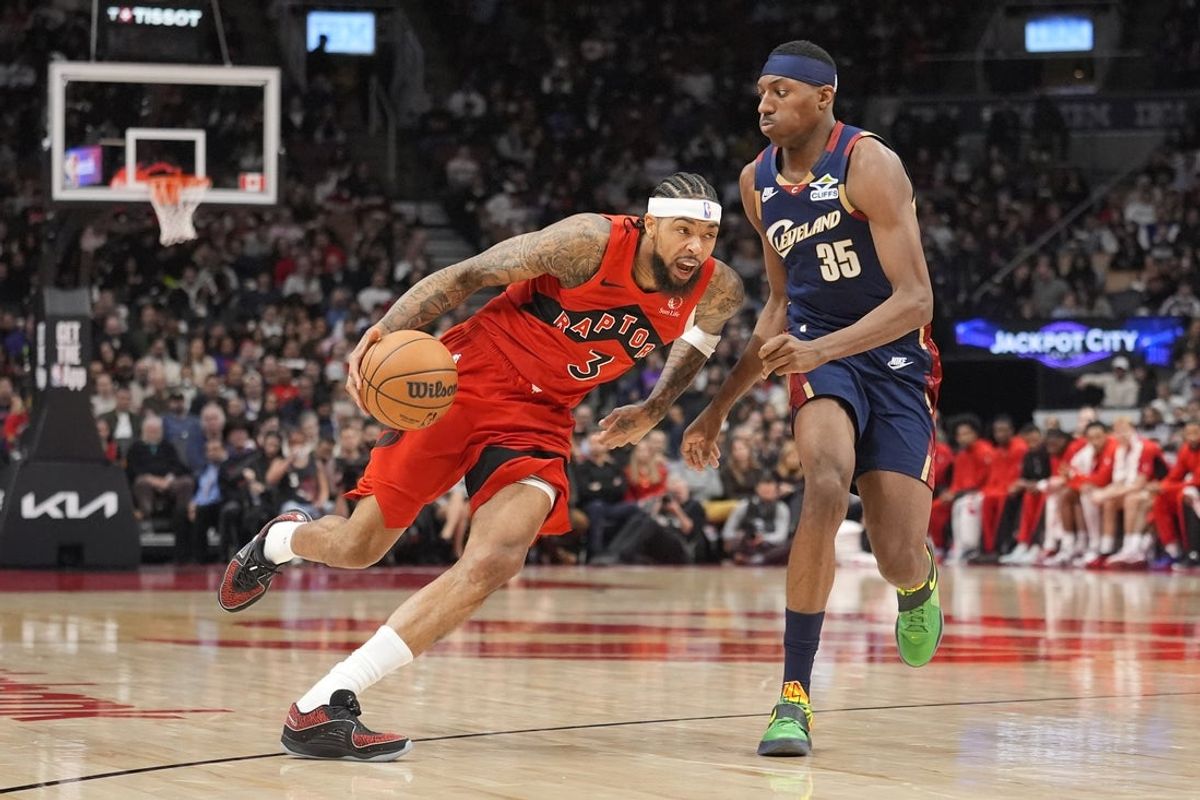 Nov 24, 2025; Toronto, Ontario, CAN; Toronto Raptors forward Brandon Ingram (3) drives to the net against Cleveland Cavaliers forwqrd Nae Qwan Tomlin (35) during the first half at Scotiabank Arena. Mandatory Credit: John E. Sokolowski-Imagn Images