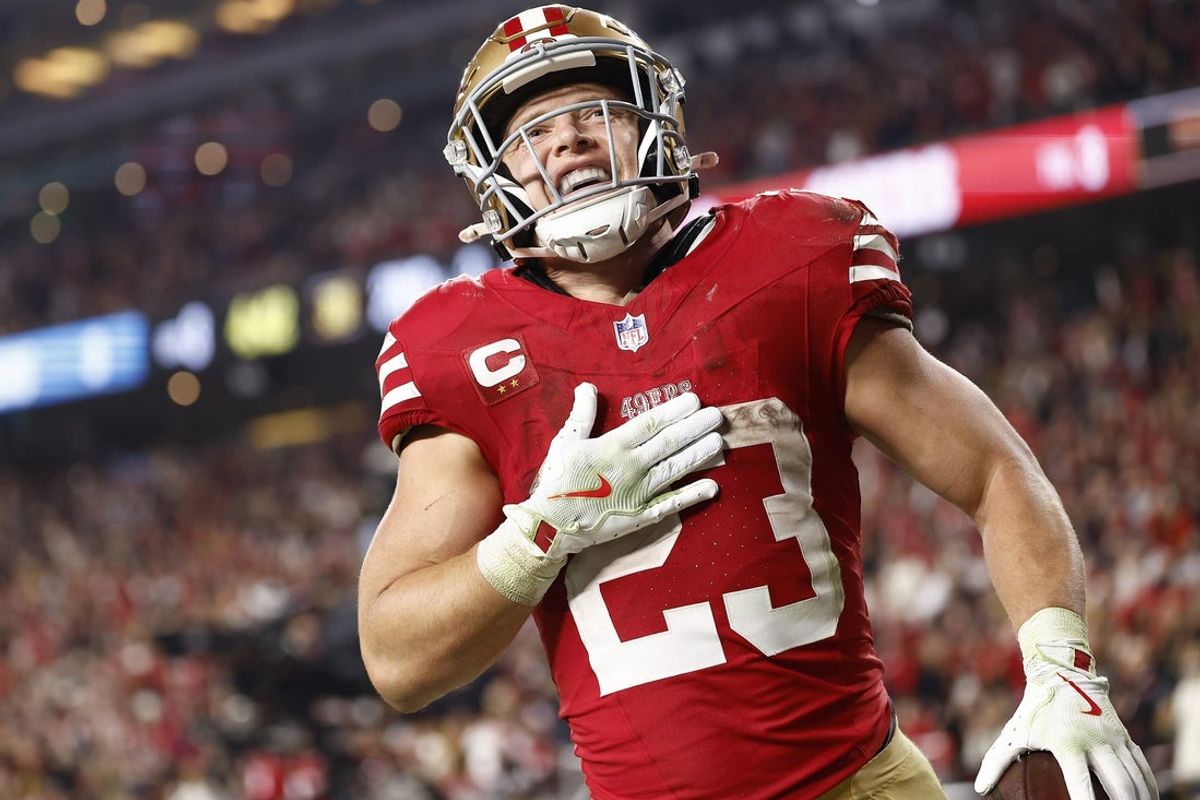 Nov 24, 2025; Santa Clara, California, USA; San Francisco 49ers running back Christian McCaffrey (23) reacts after scoring a touchdown against the Carolina Panthers during the second half at Levi's Stadium. Mandatory Credit: Kelley L Cox-Imagn Images