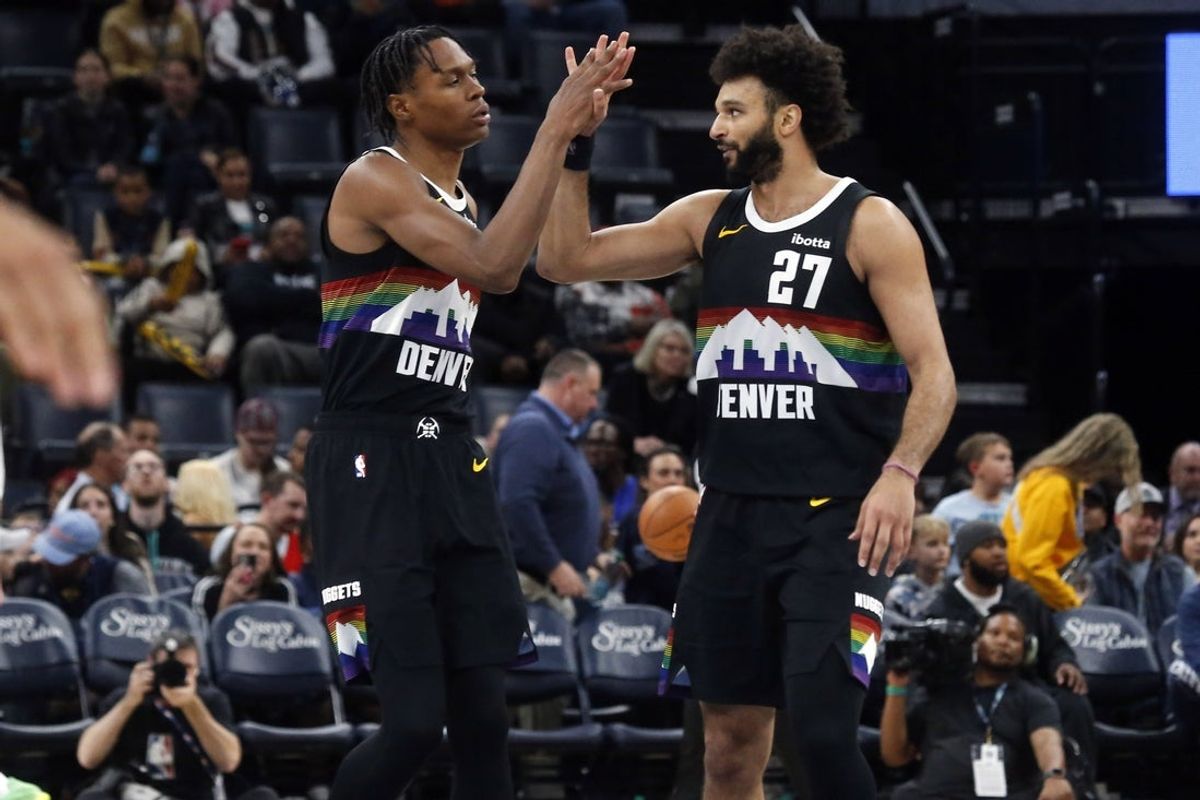 Nov 24, 2025; Memphis, Tennessee, USA; Denver Nuggets guard Peyton Watson (8) reacts with guard Jamal Murray (27) during the fourth quarter against the Memphis Grizzlies at FedExForum. Mandatory Credit: Petre Thomas-Imagn Images