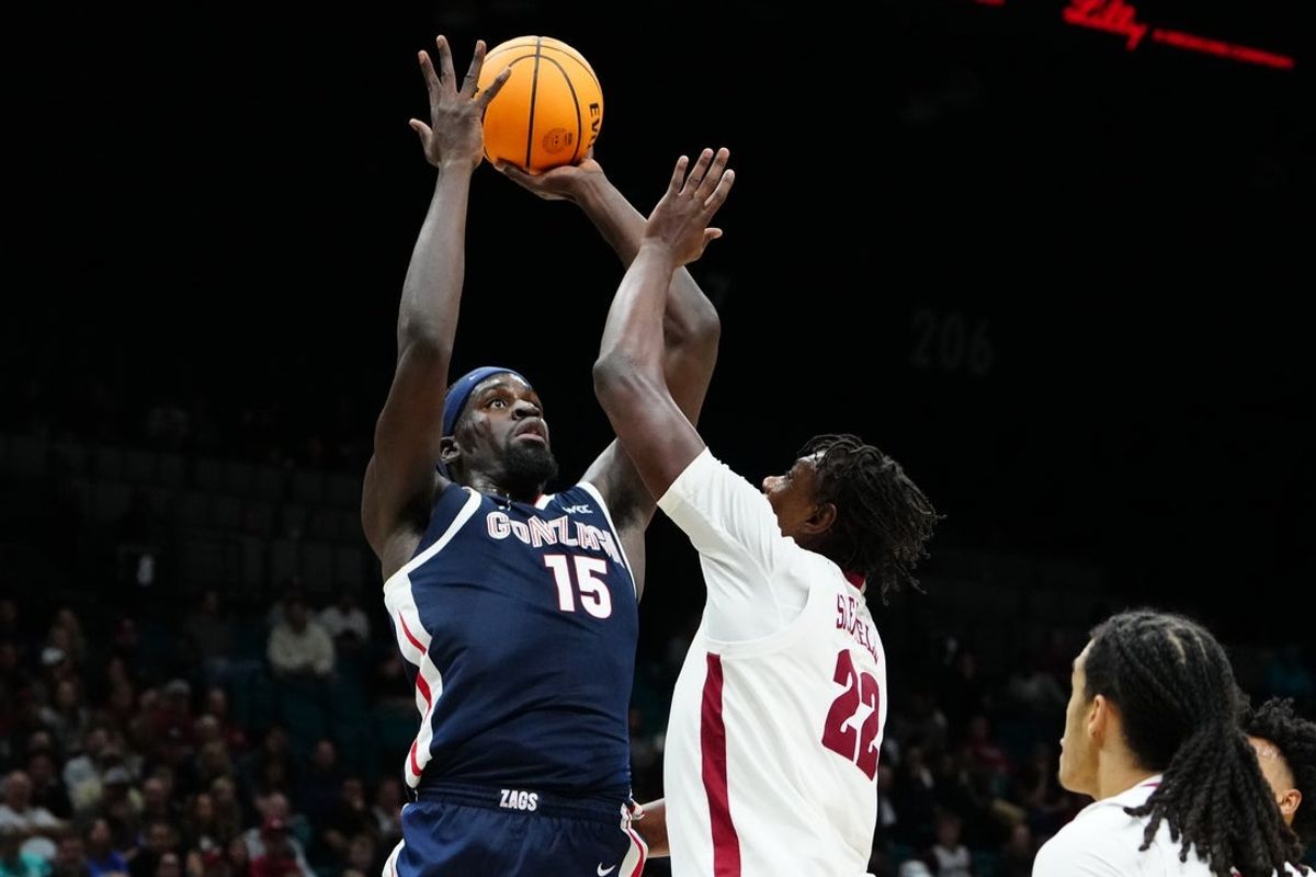 Nov 24, 2025; Las Vegas, Nevada, USA; Gonzaga Bulldogs forward Graham Ike (15) shoots against Alabama Crimson Tide forward Aiden Sherrell (22) during the second half in a 2025 Players Era Festival group play game at MGM Grand Garden Arena. Mandatory Credit: Stephen R. Sylvanie-Imagn Images