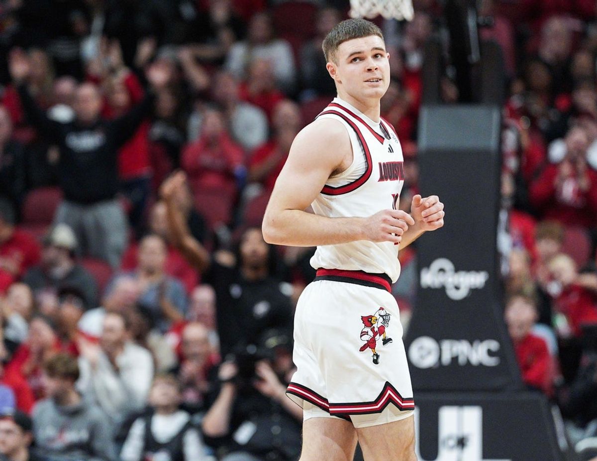 Louisville Cardinals guard Isaac McKneely (10) looks back after scoring a three-point shot against Eastern Michigan during the Cards' win over the Eagles Nov. 24, 2025 at the KFC Yum! Center in Louisville, Kentucky. McKneely had 17 points with three rebounds and one block in the game.
