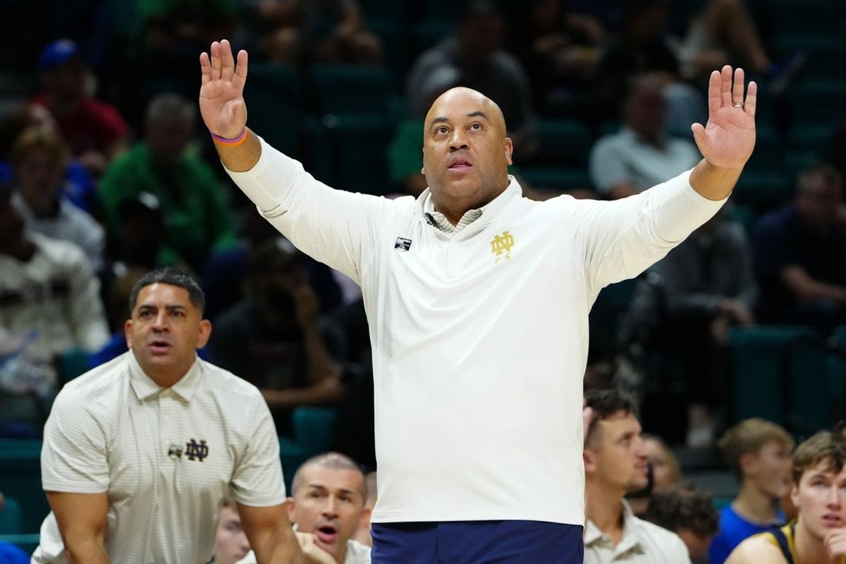 Nov 25, 2025; Las Vegas, Nevada, USA; Notre Dame Fighting Irish head coach Micah Shrewsberry gestures during the first half in a 2025 Players Era Festival group play game against the Rutgers Scarlet Knights at MGM Grand Garden Arena. Mandatory Credit: Stephen R. Sylvanie-Imagn Images