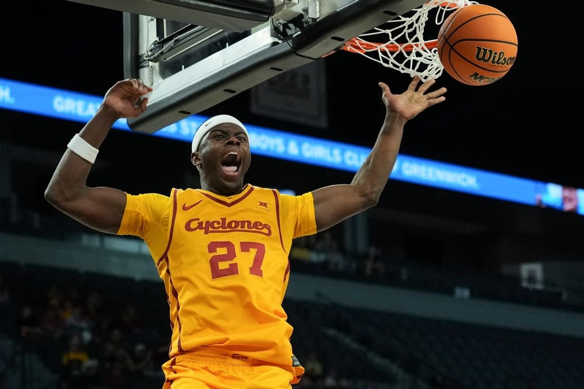 Nov 25, 2025; Las Vegas, Nevada, USA; Iowa State Cyclones guard Killyan Toure (27) celebrates after dunking the ball against the Creighton Bluejays during the first half in a 2025 Players Era Festival group play game at Michelob Ultra Arena. Mandatory Credit: Kirby Lee-Imagn Images