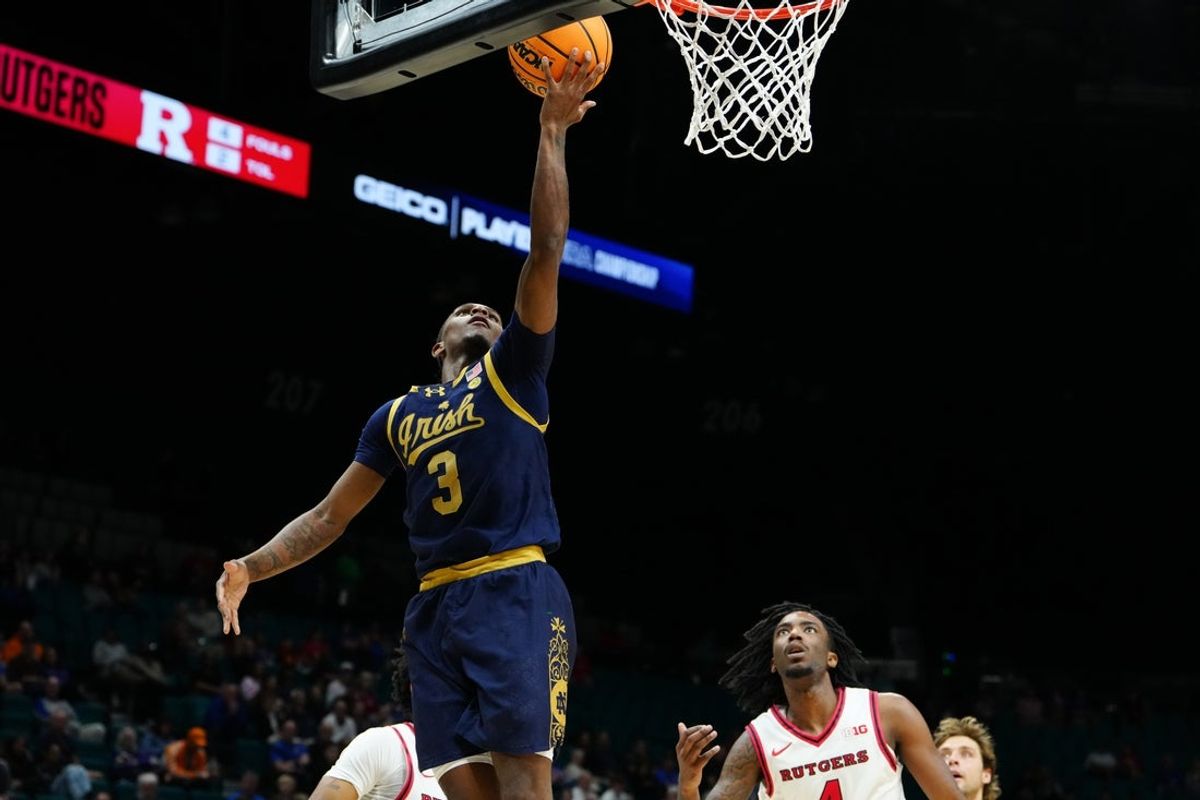 Nov 25, 2025; Las Vegas, Nevada, USA; Notre Dame Fighting Irish guard Markus Burton (3) shoots the ball against the Rutgers Scarlet Knights during the second half in a 2025 Players Era Festival group play game at MGM Grand Garden Arena. Mandatory Credit: Stephen R. Sylvanie-Imagn Images
