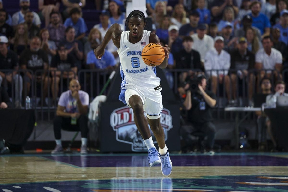 Nov 25, 2025; Fort Myers, Florida, USA; North Carolina Tar Heels forward Caleb Wilson (8) controls the ball against the St. Bonaventure Bonnies in the first half at Suncoast Credit Union Arena. Mandatory Credit: Nathan Ray Seebeck-Imagn Images