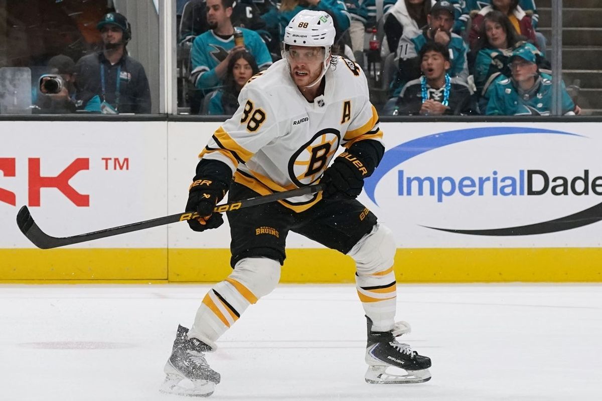 Nov 23, 2025; San Jose, California, USA;  Boston Bruins right winger David Pastrnak (88) tracks the puck during a game against the San Jose Sharks in the third period at SAP Center in San Jose. Mandatory Credit: David Gonzales-Imagn Images