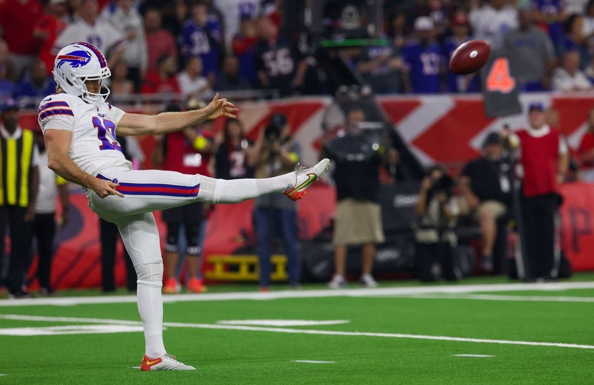 Nov 20, 2025; Houston, Texas, USA; Buffalo Bills punter Mitch Wishnowsky (19) punts against the Houston Texans in the first quarter at NRG Stadium. Mandatory Credit: Thomas Shea-Imagn Images