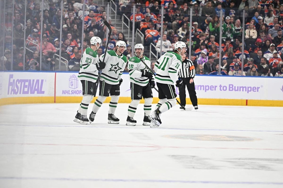 Nov 25, 2025; Edmonton, Alberta, CAN;  Dallas Stars players celebrate a goal on the Edmonton Oilers during the first period at Rogers Place. Mandatory Credit: Walter Tychnowicz-Imagn Images