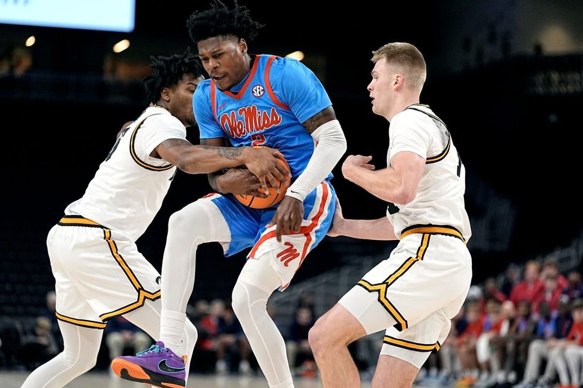 Mississippi guard AJ Storr (2) pulls in a rebound during the first half of the game against Iowa at Acrisure Arena in Palm Desert, Calif., on Nov. 25, 2025.