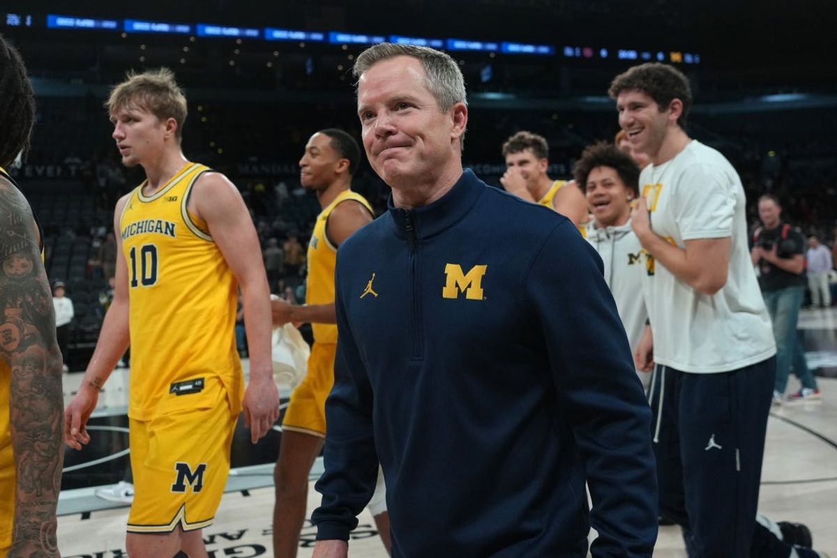 Nov 25, 2025; Las Vegas, NV, USA; Michigan Wolverines head coach Dusty May reacts after a 2025 Players Era Festival group play game against the Auburn Tigers at Michelob ULTRA Arena. Mandatory Credit: Kirby Lee-Imagn Images