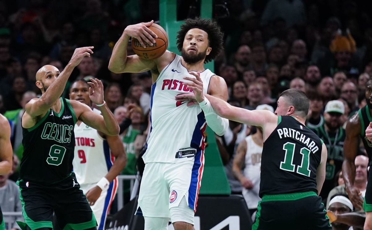 Nov 26, 2025; Boston, Massachusetts, USA; Boston Celtics guard Payton Pritchard (11) and guard Derrick White (9) defend against Detroit Pistons guard Cade Cunningham (2) late in the second half at TD Garden. Mandatory Credit: David Butler II-Imagn Images