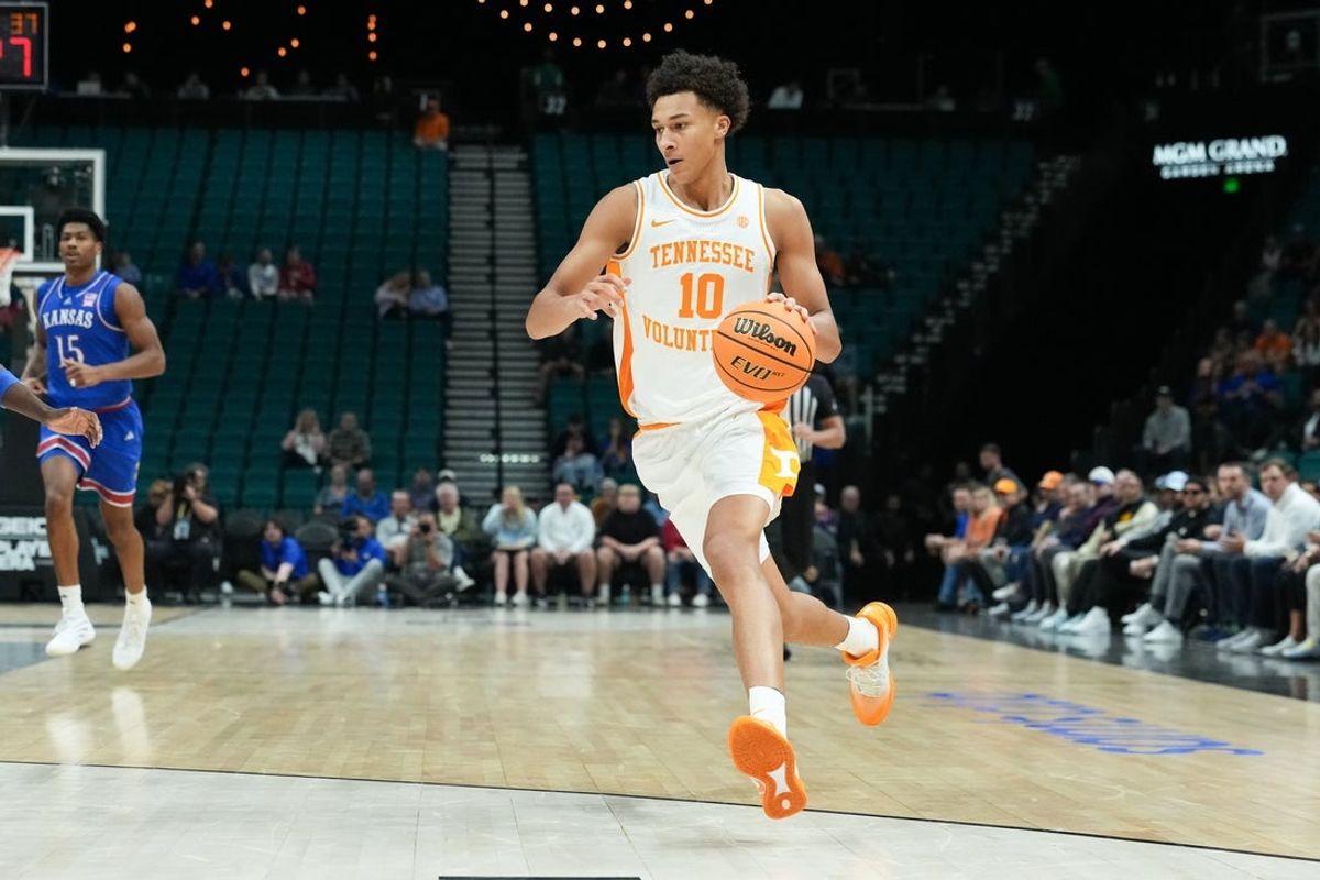 Nov 26, 2025; Las Vegas, NV, USA; Tennessee Volunteers forward Nate Ament (10) drives the ball in the first half against the Kansas Jayhawks in the 2025 Players Era Festival third place game at MGM Grand Garden Arena. Mandatory Credit: Kirby Lee-Imagn Images