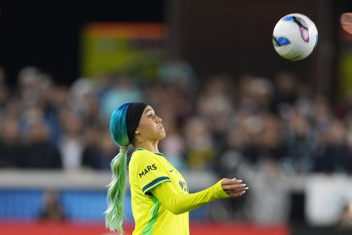 Nov 22, 2025; San Jose, California, USA; Washington Spirit forward Trinity Rodman (2) receives a pass against Gotham FC during the second half of the NWSL championship game at PayPal Park. Mandatory Credit: Darren Yamashita-Imagn Images