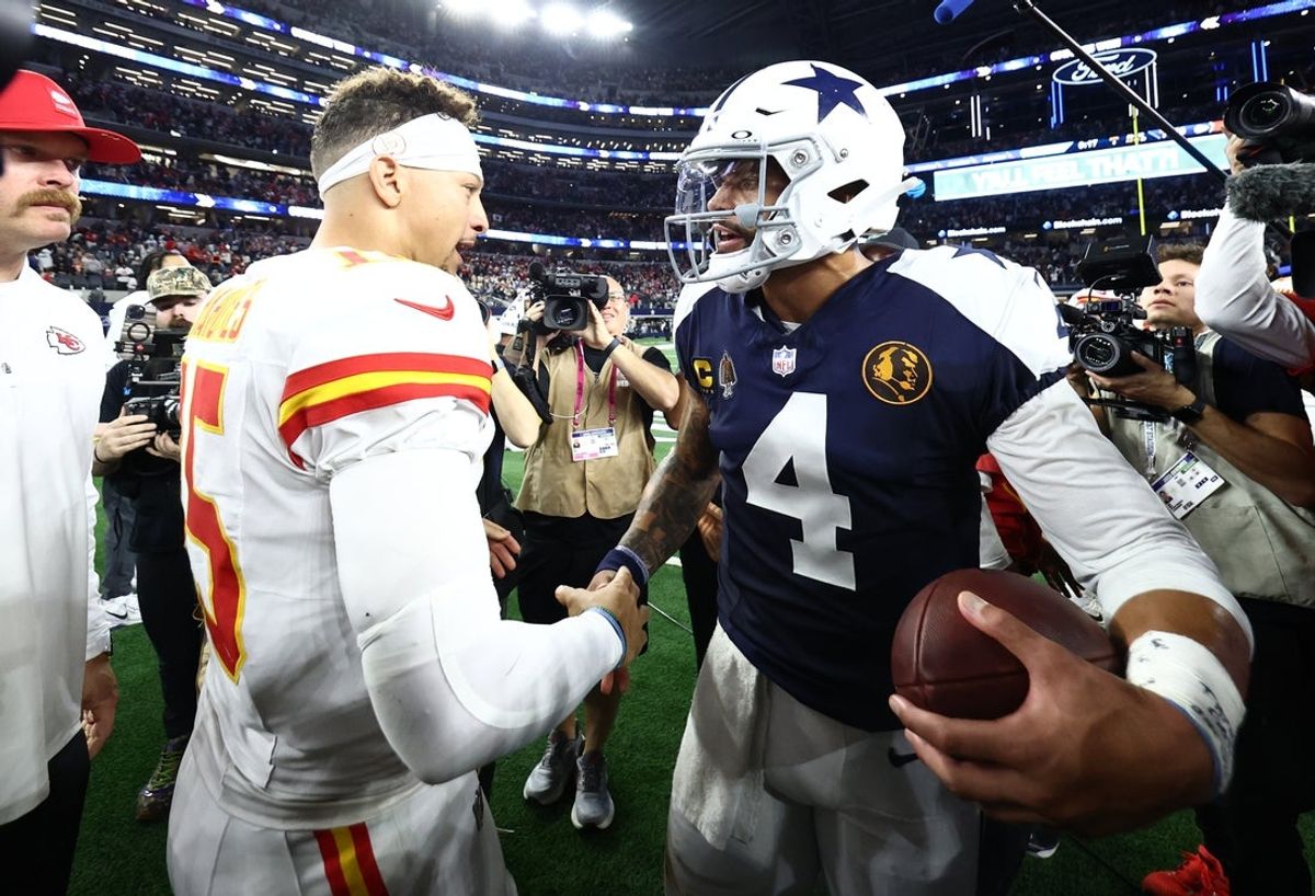 Nov 27, 2025; Arlington, Texas, USA; Kansas City Chiefs quarterback Patrick Mahomes (15) and Dallas Cowboys quarterback Dak Prescott (4) greet each other after the game at AT&T Stadium. Mandatory Credit: Kevin Jairaj-Imagn Images