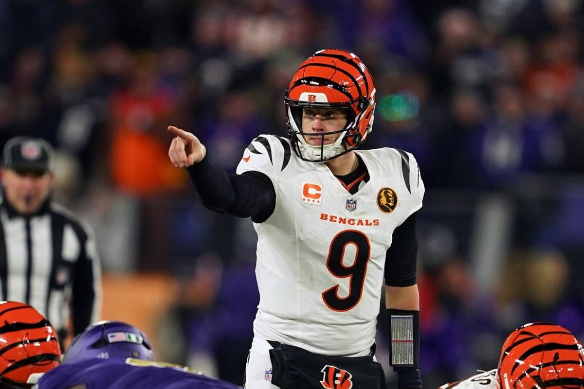 Nov 27, 2025; Baltimore, Maryland, USA; Cincinnati Bengals quarterback Joe Burrow (9) reacts against the Baltimore Ravens during the second half at M&T Bank Stadium. Mandatory Credit: Mitch Stringer-Imagn Images