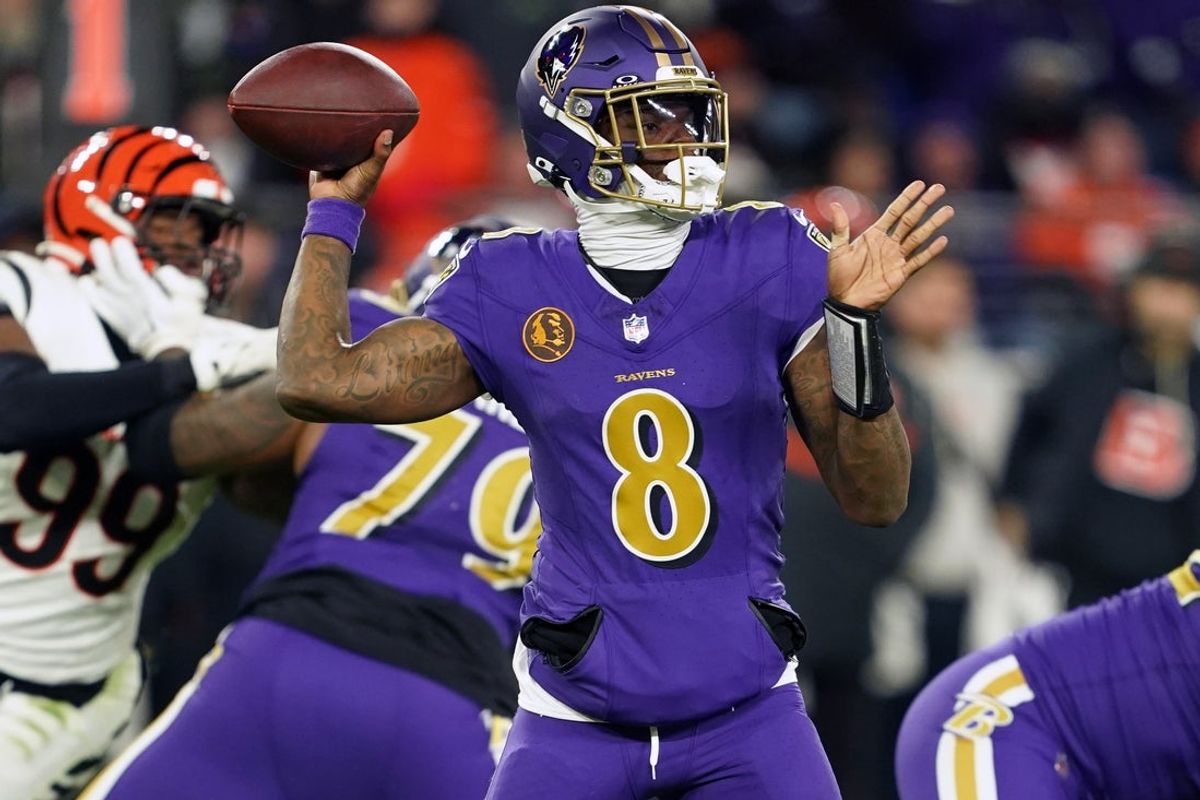 Nov 27, 2025; Baltimore, Maryland, USA; Baltimore Ravens quarterback Lamar Jackson (8) drops back to pass against the Cincinnati Bengals during the second half at M&T Bank Stadium. Mandatory Credit: Mitch Stringer-Imagn Images