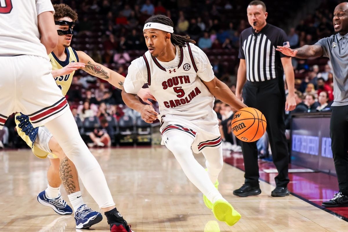 Nov 28, 2025; Columbia, South Carolina, USA; South Carolina Gamecocks guard Meechie Johnson (5) drives against the Charleston Southern Buccaneers in the first half at Colonial Life Arena. Mandatory Credit: Jeff Blake-Imagn Images