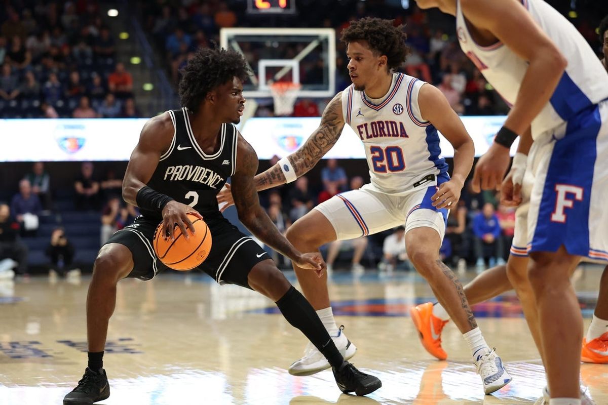 Nov 28, 2025; San Diego, CA, USA; Providence Friars guard Jaylin Sellers (2) handles the ball against Florida Gators guard Isaiah Brown (20) during the second half at Jenny Craig Pavilion. Mandatory Credit: Abe Arredondo-Imagn Images