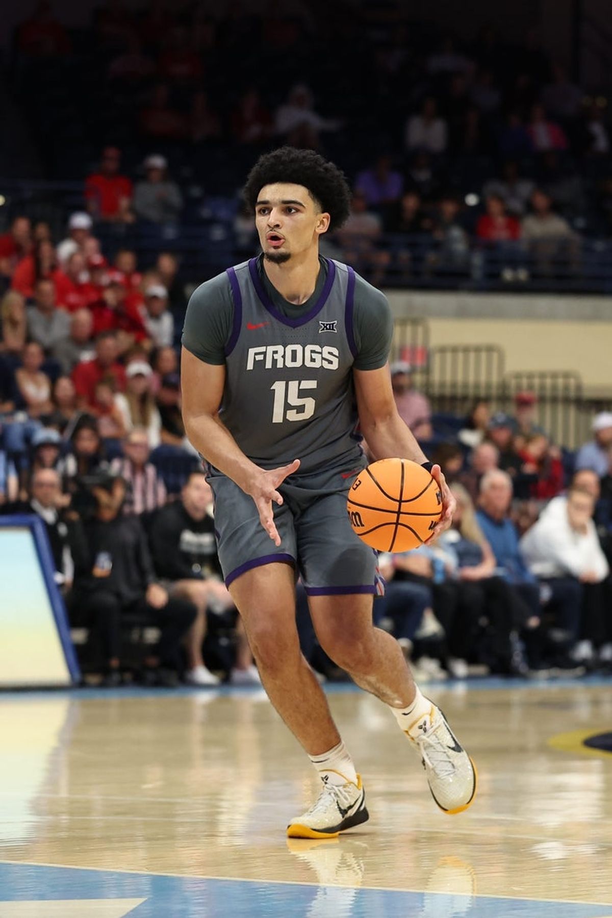 Nov 28, 2025; San Diego, CA, USA; Texas Christian University Horned Frogs forward David Punch (15) handles the ball against the Wisconsin Badgers during the second half at Jenny Craig Pavilion. Mandatory Credit: Abe Arredondo-Imagn Images