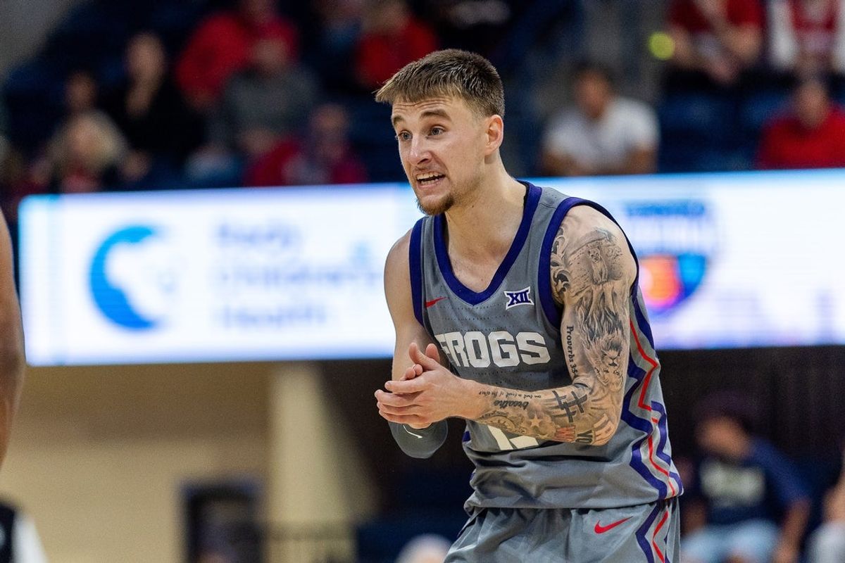 Nov 28, 2025; San Diego, CA, USA; Texas Christian University Horned Frogs guard Brock Harding (2) celebrates after scoring against the Wisconsin Badgers during the second half at Jenny Craig Pavilion. Mandatory Credit: Abe Arredondo-Imagn Images