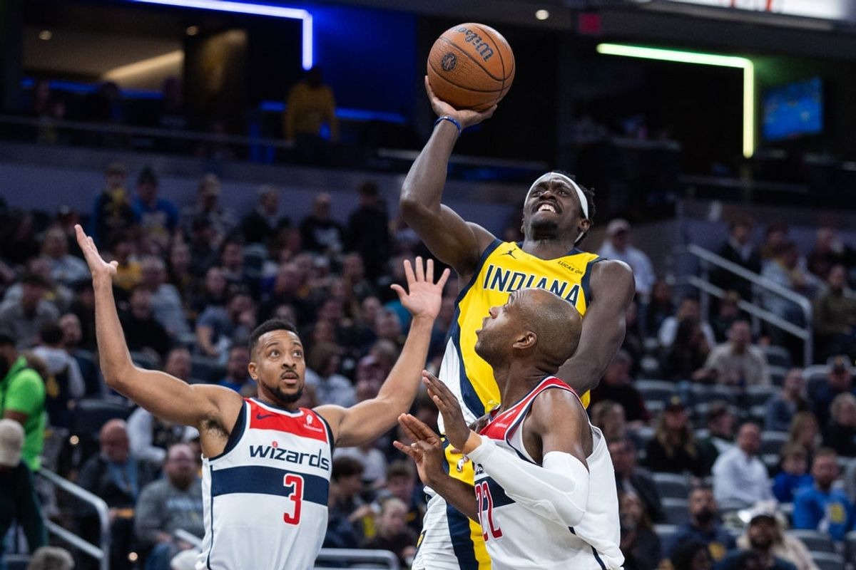 Nov 28, 2025; Indianapolis, Indiana, USA;  Indiana Pacers forward Pascal Siakam (43) shoots the ball while Washington Wizards forward Khris Middleton (22) defends in the first half at Gainbridge Fieldhouse. Mandatory Credit: Trevor Ruszkowski-Imagn Images