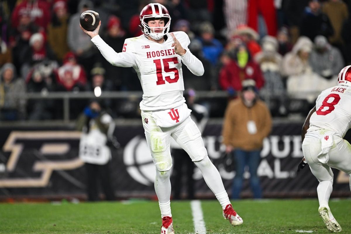 Nov 28, 2025; West Lafayette, Indiana, USA; Indiana Hoosiers quarterback Fernando Mendoza (15) throws a pass during the third quarter against the Purdue Boilermakers at Ross-Ade Stadium. Mandatory Credit: Marc Lebryk-Imagn Images