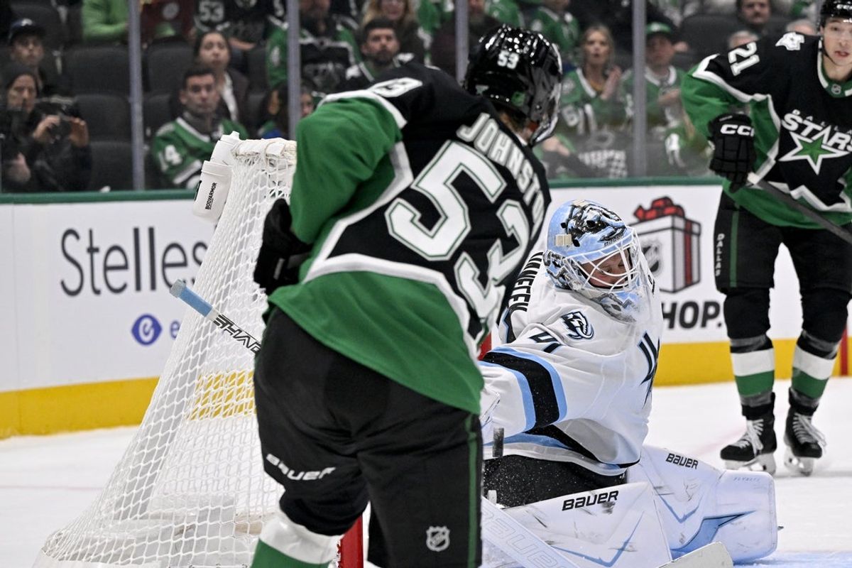 Nov 28, 2025; Dallas, Texas, USA; Dallas Stars center Wyatt Johnston (53) scores a power play goal past Utah Mammoth goaltender Vitek Vanecek (41) during the second period at the American Airlines Center. Mandatory Credit: Jerome Miron-Imagn Images