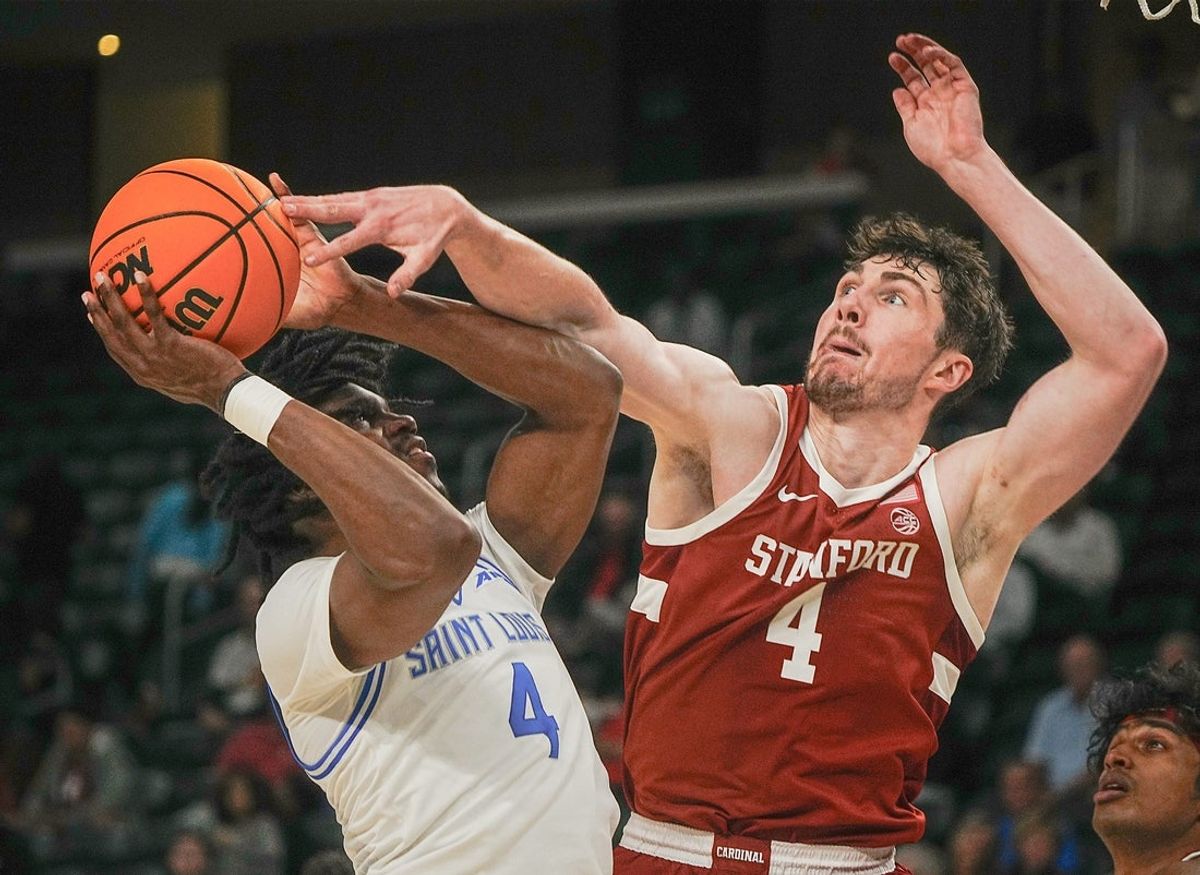 AJ Rohosy, 4, of Stanford defends Amari McCottry of St. Louis University during the Acrisure Invitational Champioship game at Acrisure Arena in Palm Desert, Calif., Nov. 28, 2025.
