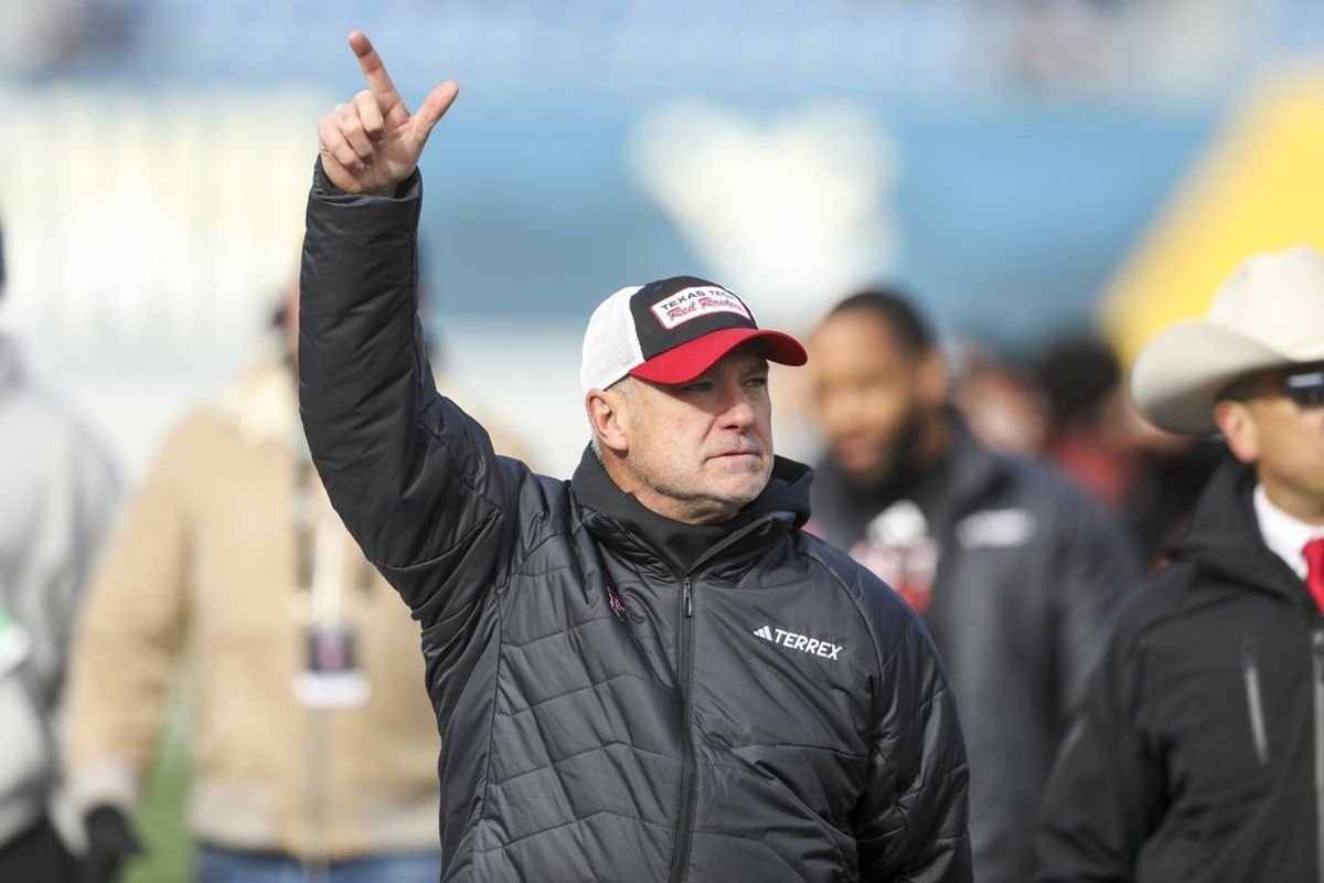 Nov 29, 2025; Morgantown, West Virginia, USA; Texas Tech Red Raiders head coach Joey McGuire says hello to fans during the pregame against the West Virginia Mountaineers at Milan Puskar Stadium. Mandatory Credit: Ben Queen-Imagn Images