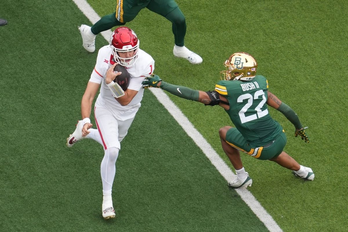 Nov 29, 2025; Waco, Texas, USA; Houston Cougars quarterback Conner Weigman (1) runs the ball for a 28 yard touchdown against the Baylor Bears during the first half at McLane Stadium. Mandatory Credit: Chris Jones-Imagn Images